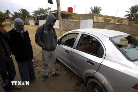 Hiện trường vụ đánh bom ở Najaf. (Nguồn: EPA/TTXVN)