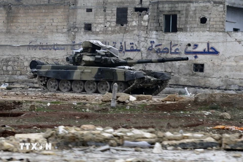 Xe quân sự Syria tại thị trấn al-Bab. (Nguồn: AP/TTXVN)