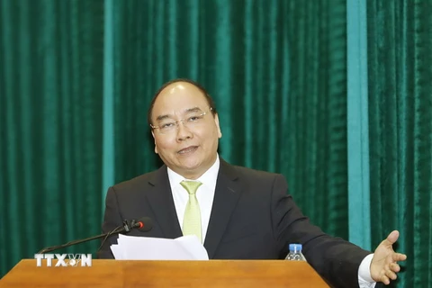 Thủ tướng Nguyễn Xuân Phúc dự và phát biểu tại Hội nghị trực tuyến Triển khai nhiệm vụ công tác Y tế năm 2017. (Ảnh: Thống Nhất/TTXVN)