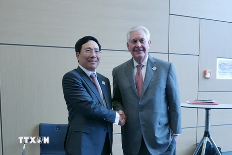 Phó Thủ tướng, Bộ trưởng Ngoại giao Phạm Bình Minh có cuộc gặp với Bộ trưởng Ngoại giao Hoa Kỳ Rex Tillerson. (Ảnh: Phạm Văn Thắng/TTXVN)