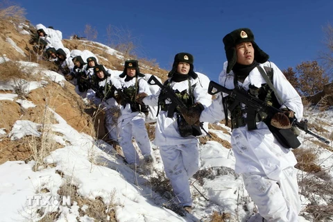 Binh sỹ quân đội Trung Quốc tham gia tập trận ở khu vực đông bắc tỉnh Hắc Long Giang. Ảnh minh họa. (Nguồn: AFP/TTXVN)