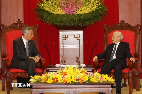 Tổng Bí thư Nguyễn Phú Trọng tiếp Thủ tướng Singapore Lý Hiển Long đang thăm chính thức Việt Nam. (Ảnh: Trí Dũng/TTXVN)