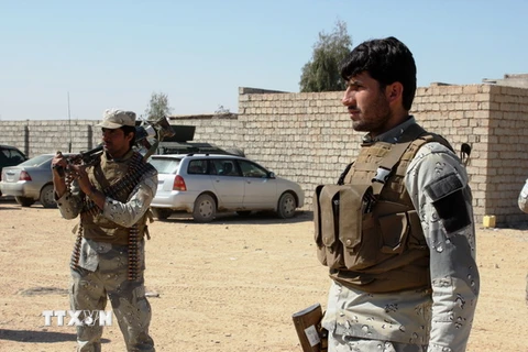 Lực lượng an ninh Afghanistan trong chiến dịch truy quét phiến quân Taliban ở tỉnh Helmand ngày 13/3. (Nguồn: THX/TTXVN)