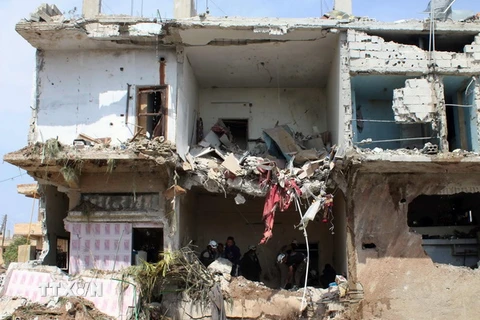 Một ngôi nhà bị phá hủy trong cuộc không kích ở Daraa, Syria, ngày 8/4. (Nguồn: AFP/TTXVN)