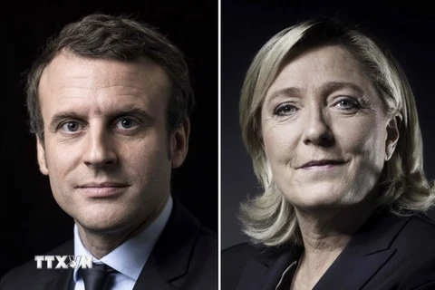Ứng cử viên Emmanuel Macron (trái) và ứng cử viên Marine Le Pen (phải). (Nguồn: AFP/TTXVN)