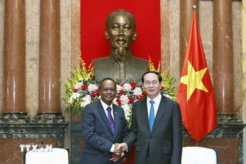 Chủ tịch nước Trần Đại Quang tiếp Ngài Rakotovao Rivo, Bộ trưởng Phủ Tổng thống Cộng hoà Madagascar phụ trách Nông nghiệp và Chăn nuôi nhân chuyến thăm và làm việc tại Việt Nam. (Ảnh: Nhan Sáng/TTXVN)