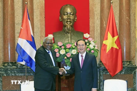 Chủ tịch nước Trần Đại Quang tiếp đồng chí Esteban Lazo Hernandes, Ủy viên Bộ Chính trị, Chủ tịch Quốc hội Cộng hòa Cuba đang có chuyến thăm chính thức Việt Nam. (Ảnh: Nhan Sáng/TTXVN)
