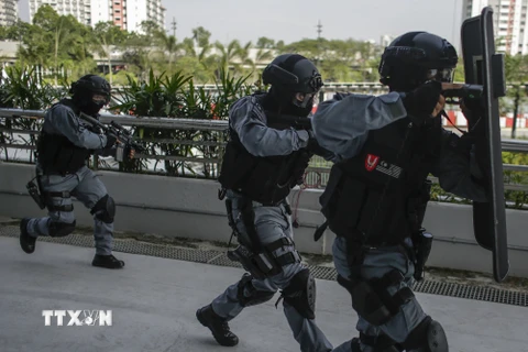 Lực lượng cảnh sát đặc nhiệm Hoàng gia Malaysia tại một buổi huấn luyện ở Kuala Lumpur ngày 25/5. (Nguồn: EPA/TTXVN)