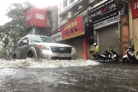 Nhiều tuyến phố Hà Nội bị ngập sâu. (Nguồn: Sơn Bách/Vietnam+)