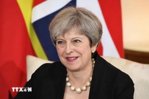 Thủ tướng Anh Theresa May tại một sự kiện ở London ngày 13/7. (Nguồn: AFP/TTXVN)