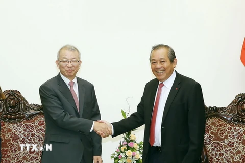 Phó Thủ tướng Thường trực Trương Hòa Bình tiếp Chánh án Toà án Tối cao Hàn Quốc ông Yang Sung Tae đang thăm và làm việc tại Việt Nam. (Ảnh: Nguyễn Dân/TTXVN)