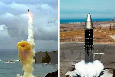 Tên lửa đạn đạo liên lục địa "Minuteman 3" (trái) không trang bị vũ khí rời bệ phóng trong một cuộc thử nghiệm. (Nguồn: AFP/ TTXVN)