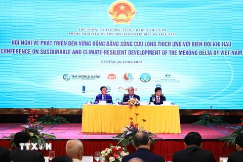 Thủ tướng Nguyễn Xuân Phúc dự Hội nghị về phát triển bền vững Đồng bằng sông Cửu Long thích ứng với biến đổi khí hậu. (Ảnh: Thống Nhất/TTXVN)