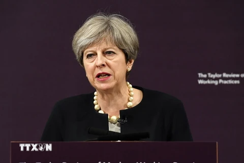 Thủ tướng Anh Theresa May trong bài phát biểu tại London ngày 11/7. (Nguồn: EPA/TTXVN)
