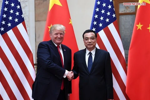 Thủ tướng Trung Quốc Lý Khắc Cường hội kiến Tổng thống Mỹ Donald Trump. (Nguồn: Xinhua)