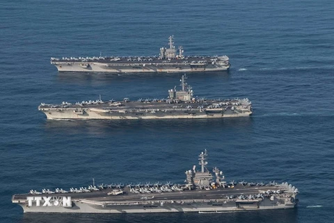 Tàu sân bay USS Ronald Reagan, Theodore Roosevelt và Nimitz của Mỹ tham gia cuộc tập trận chung Hàn - Mỹ trên vùng biển phía đông Hàn Quốc ngày 12/11. (Nguồn: Yonhap/TTXVN)