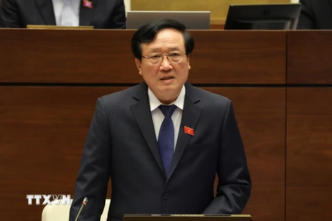Chánh án Tòa án nhân dân Tối cao Nguyễn Hòa Bình trả lời chất vấn của đại biểu Quốc hội. (Ảnh: Phương Hoa/TTXVN)