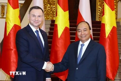 Thủ tướng Nguyễn Xuân Phúc hội kiến Tổng thống Cộng hòa Ba Lan Andrzej Duda. (Ảnh: Thống Nhất/TTXVN)