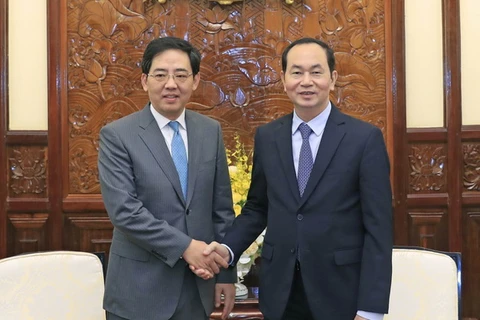 Chủ tịch nước Trần Đại Quang tiếp Đại sứ Trung Quốc Hồng Tiểu Dũng đến chào từ biệt, kết thúc nhiệm kỳ công tác tại Việt Nam. (Ảnh: Nhan Sáng/TTXVN)