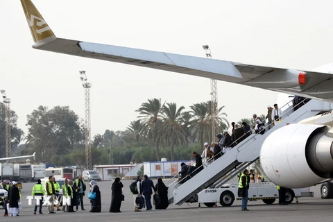 Hành khách đáp máy bay tại sân bay quốc tế Tripoli (Libya) ngày 20/1. Ảnh minh họa. (Nguồn: THX/TTXVN)