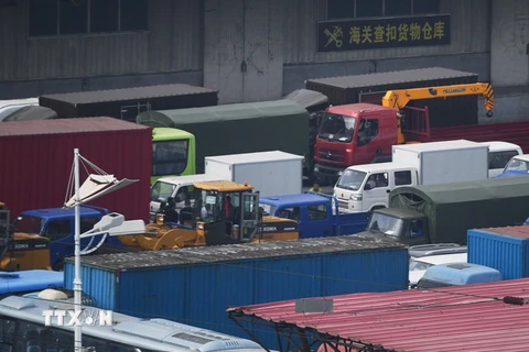 Xe tải tại khu vực Đan Đông ở biên giới Trung Quốc-Triều Tiên. (Nguồn: AFP/TTXVN)