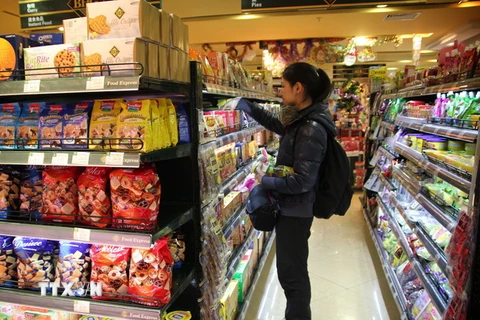 Hàng hóa được bày bán tại một siêu thị ở Bắc Kinh, Trung Quốc. (Nguồn: AFP/ TTXVN)