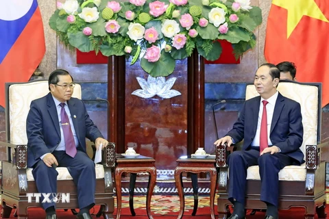 Chủ tịch nước Trần Đại Quang tiếp Phó Chủ tịch Quốc hội Lào Sengnouane Sayalat đang có chuyến thăm chính thức Việt Nam. (Ảnh: Nhan Sáng/TTXVN)