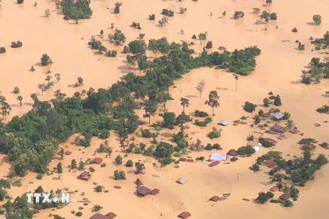 Cảnh ngập lụt sau khi đập thủy điện ở tỉnh Attapeu, Lào bị vỡ ngày 24/7. Ảnh: (Nguồn: THX/TTXVN)