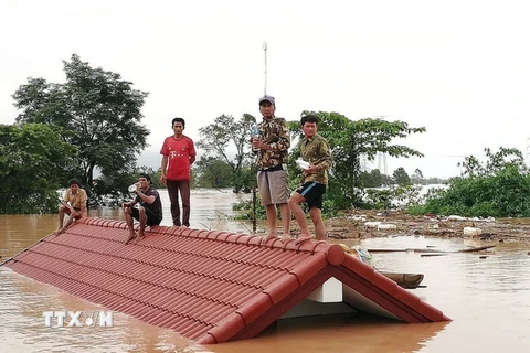 Cảnh ngập lụt sau khi đập thủy điện ở tỉnh Attapeu, Lào bị vỡ ngày 24/7. Ảnh: (Nguồn: THX/TTXVN)
