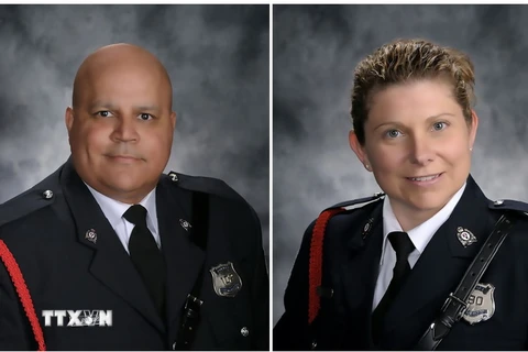 Lawrence Robert Costello (trái) và Sara Mae Helen Burns (phải)- hai nhân viên cảnh sát thiệt mạng trong vụ bắn súng ở Fredericton, Canada . (Ảnh: AFP/TTXVN)