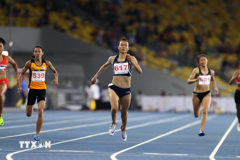 Lê Tú Chinh (số 617) bứt phá về đích đoạt Huy chương Vàng tại Sea Games 29. (Ảnh: Quốc Khánh/TTXVN)