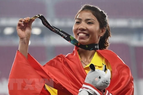 Vận động viên Bùi Thị Thu Thảo giành Huy chương Vàng nội dung nhảy xa nữ tại ASIAD 2018. (Nguồn: AFP/TTXVN)