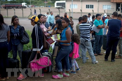Người di cư Venezuela tại thị trấn Pacaraima, bang Roraima, Brazil ngày 28/2. (Nguồn: AFP/TTXVN)