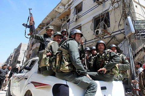 Lực lượng an ninh Syria ở Damascus. (Nguồn: Reuters)