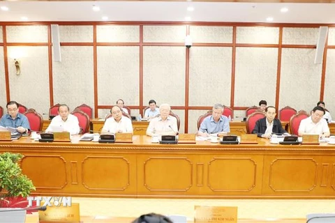 Tổng Bí thư Nguyễn Phú Trọng (giữa) chủ trì cuộc họp. (Ảnh: Trí Dũng/TTXVN)
