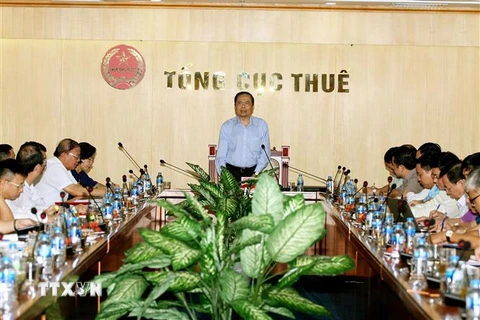 Chủ tịch Ủy ban Trung ương Mặt trận Tổ quốc Việt Nam Trần Thanh Mẫn phát biểu tại buổi làm việc với Tổng cục Thuế. (Ảnh: Nguyễn Dân/TTXVN)