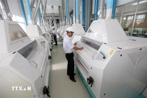 Dây chuyền sản xuất, đóng gói bột mì tại Công ty TNHH Uni-President Việt Nam, vốn đầu tư của Đài Loan tại khu công nghiệp Điện Nam - Điện Ngọc (Quảng Nam). (Ảnh: Danh Lam/TTXVN)