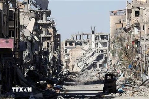 Cảnh đổ nát do xung đột ở Raqqa, Syria. (Ảnh: IRNA/ TTXVN)