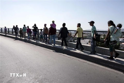 Người di cư Trung Mỹ tại Tijuana, bang Baja California, Mexico ngày 28/4. (Ảnh: AFP/TTXVN)