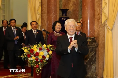 Tổng Bí thư, Chủ tịch nước Nguyễn Phú Trọng đến dự cuộc gặp mặt với cán bộ, công chức, người lao động cơ quan Văn phòng Chủ tịch nước. (Ảnh: Trí Dũng/TTXVN)
