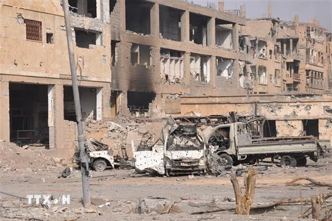 Cảnh đổ nát ở thành phố Deir Ezzor, Đông Syria sau các cuộc xung đột ngày 4/11/2017. (Ảnh: AFP/ TTXVN)