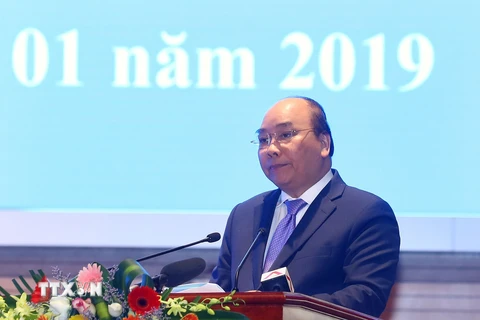 Thủ tướng Nguyễn Xuân Phúc đọc diễn văn tại Lễ kỷ niệm. (Ảnh: Thống Nhất/TTXVN)
