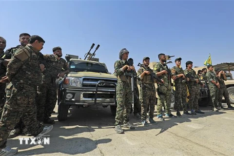 Các tay súng người Kurd tại thị trấn Shadadi, cách thành phố Hassakeh ở đông bắc Syria 60km, ngày 11/9/2018. (Ảnh: AFP/ TTXVN)