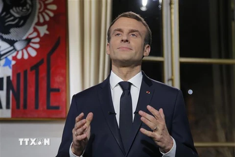 Tổng thống Pháp Emmanuel Macron phát biểu tại Paris, Pháp, ngày 31/12/2018. (Ảnh: AFP/TTXVN)