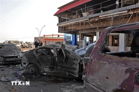 Hiện trường một vụ đánh bom xe tại Mosul, Iraq, ngày 9/11/2018. (Ảnh: AFP/ TTXVN)