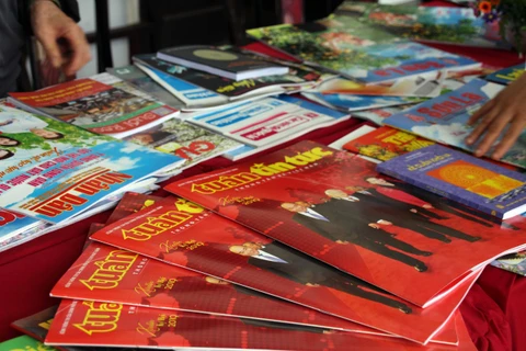 Các ấn phẩm trưng bày tại Hội báo Xuân Kỷ Hợi 2019 tại Sơn La. (Ảnh: Diệp Anh/TTXVN)