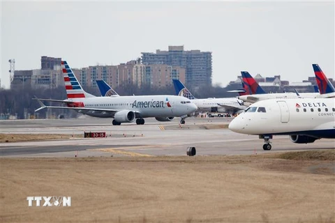 Máy bay Boeing 737 Max 8 của Hãng hàng không American Airlines hạ cánh tại sân bay quốc gia Reagan ở Washington DC., ngày 13/3/2019. (Ảnh: THX/TTXVN)