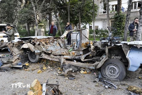 Hiện trường một vụ đánh bom ở Damascus, Syria, ngày 24/1/2019. (Ảnh: AFP/ TTXVN)
