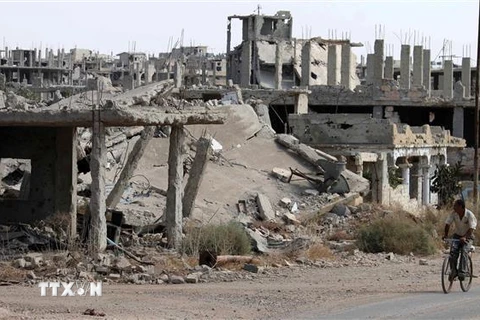 Cảnh đổ nát sau các cuộc giao tranh ở thành phố Daraa, Syria. (Ảnh: AFP/TTXVN)