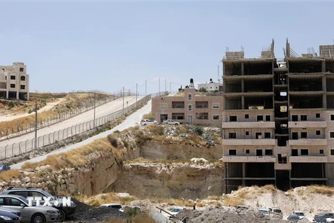 Những tòa nhà của người Palestine tại thành phố Sur Baher , miền Đông Jerusalem, ngày 19/7. (Ảnh: AFP/TTXVN)